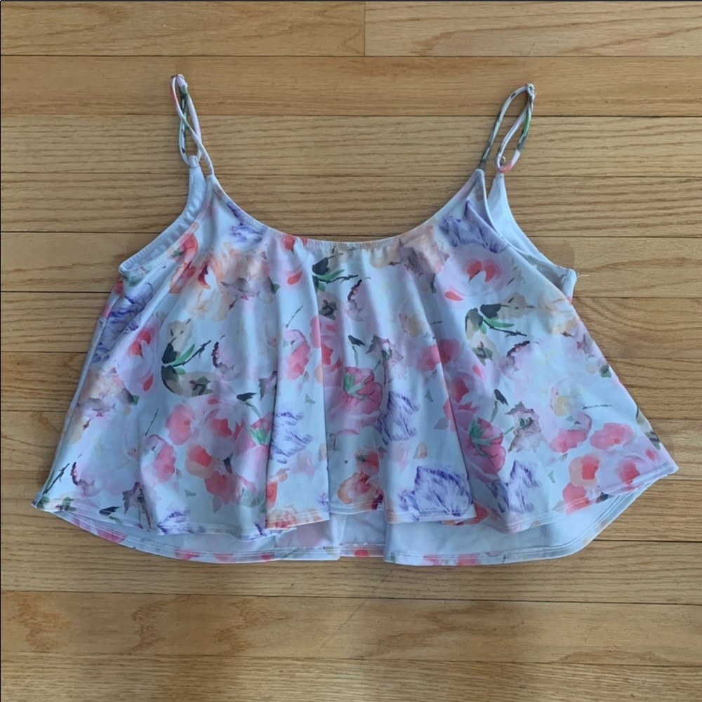 Kortni Jeane flows swim top